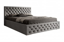 Pikowane łóżko z wysokim...